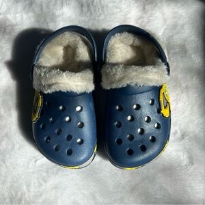 Blue Fur Lined Clogs with Yellow Accents Trucks